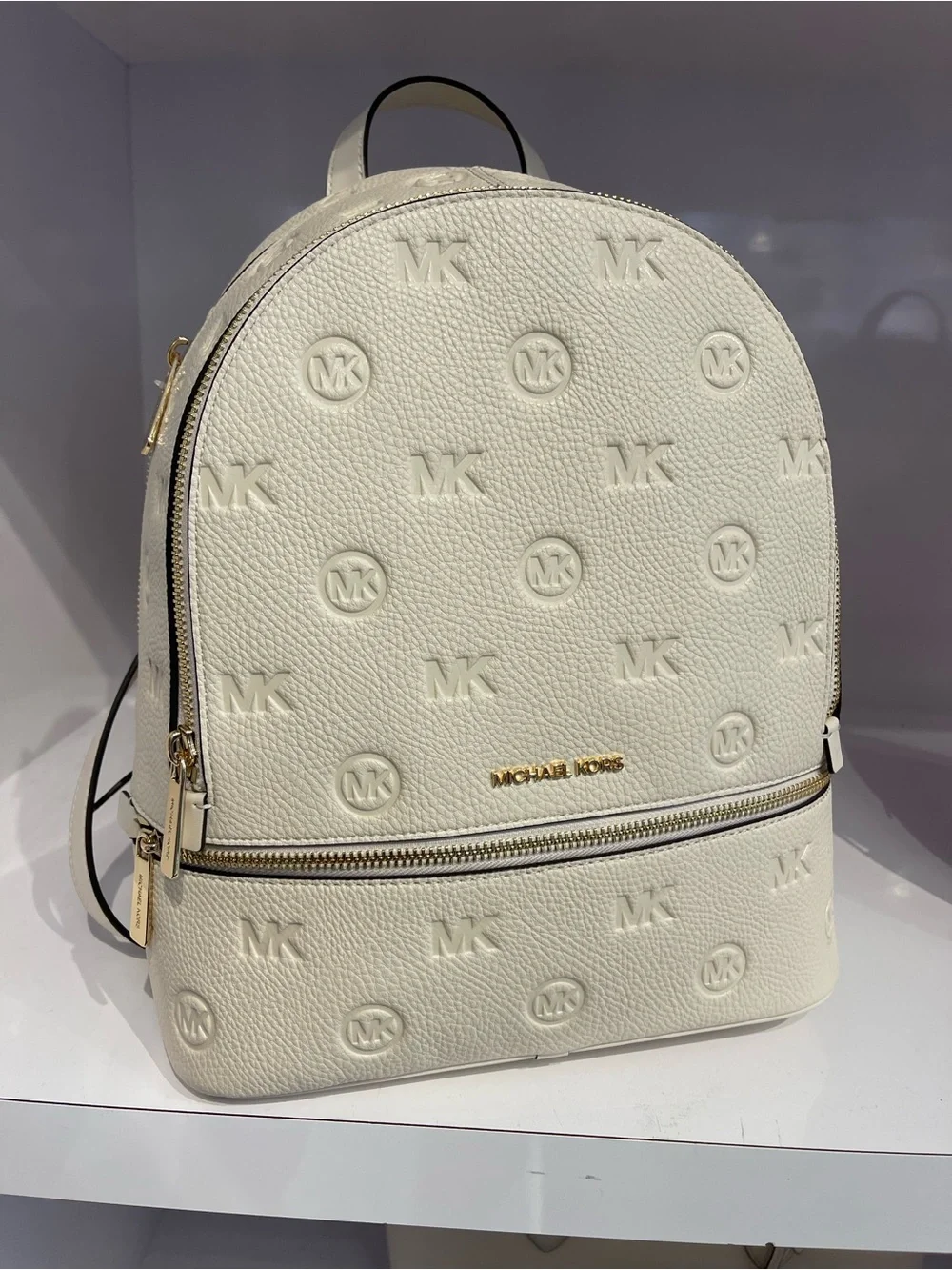 Michael Kors Rhea Medium Zip Logo Debossed Backpack Light Cream NWT